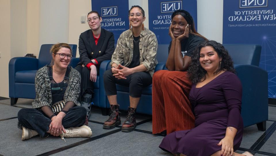 The panelists pose with UNE Director of Intercultural Student Engagement Andrea Peredes